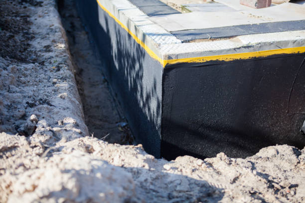 Professional Interior Drainage System technician working in Porterfield, WI